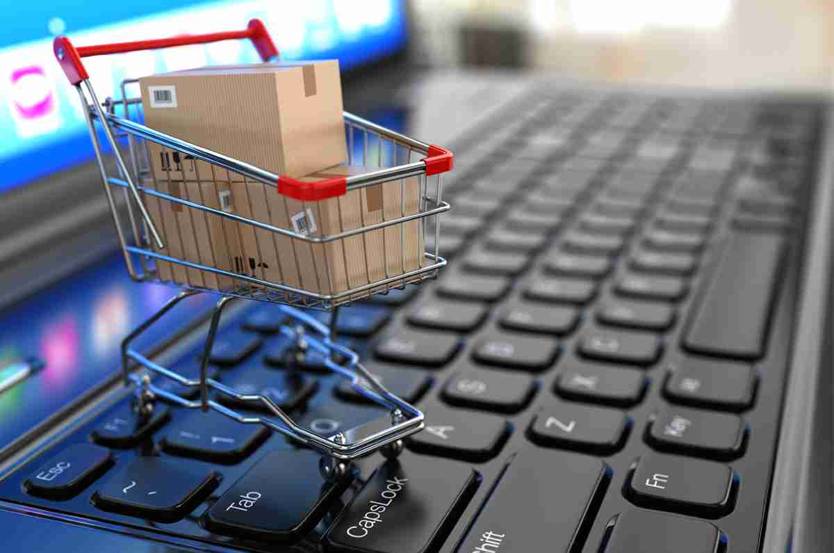 shopping cart on a laptop symbolizing ecommerce