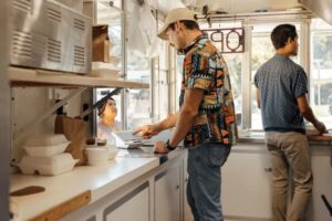 Customer paying with a Clover Mini terminal